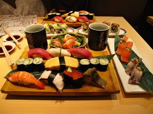 Enjoying sushi, Japan
